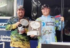CJ Lockamy and dad JJ on the winners stage.
