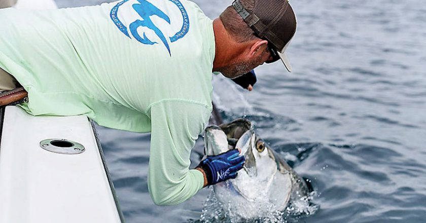 Capt Justin Leake of Panama City Inshore spends a lot of time wrangling tarpon.