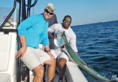 Capt. Lionel James putting clients on the tarpon.