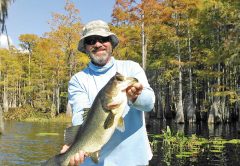 Capt. C-note with a 7 lb. Dry Lake bass.