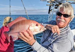 Capt. Chester showing how it’s done with a deep jig.