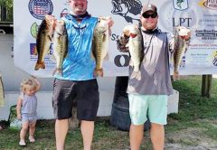 Chris Kincaid and CJ Lockamy with their winning bag of 22 pounds of Talquin bass.