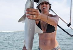 Cinda making friends with our local sharks.