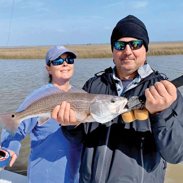 Dan & Jessica Susich duked it out on Capt. Kens boat. Tough conditions but caught Redfish!