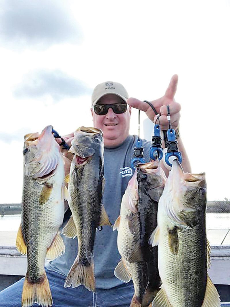 Dan with a nice haul of Deerpoint bass he released.