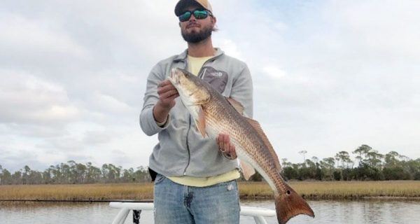 David Bender of Panama City catching winter reds.