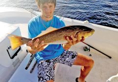 Dylan Shingler getting in some redfish action with Dad.