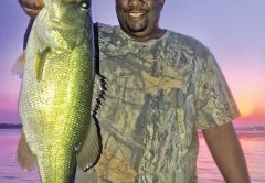 Eddie Henderson with his PB bass caught on Seminole with guide Paul Tyre.