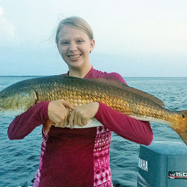 Emily caught this sweet red fishing with dad.