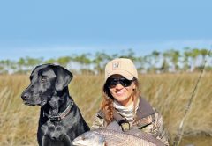 Emma Hurley with a pretty redfish she site fished along with the Murph Dog, post Hurricane Michael.