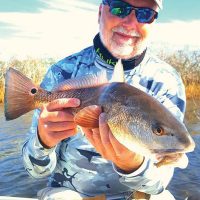 Eric Nelson, owner of Southern Cleaning Supply, convinced this red to inhale a crab pattern at 40 feet with Capt. Steve Bachman of Panama City Inshore.