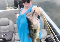 Gale Goodman, co-owner of Wingates Lunker Lodge, with a healthy Seminole bass.