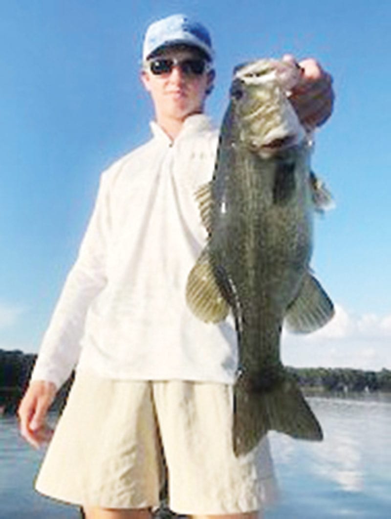 Garrett Cox of the Bainbridge High School Bass Cats with a nice one he caught fishing with Paul Tyre.