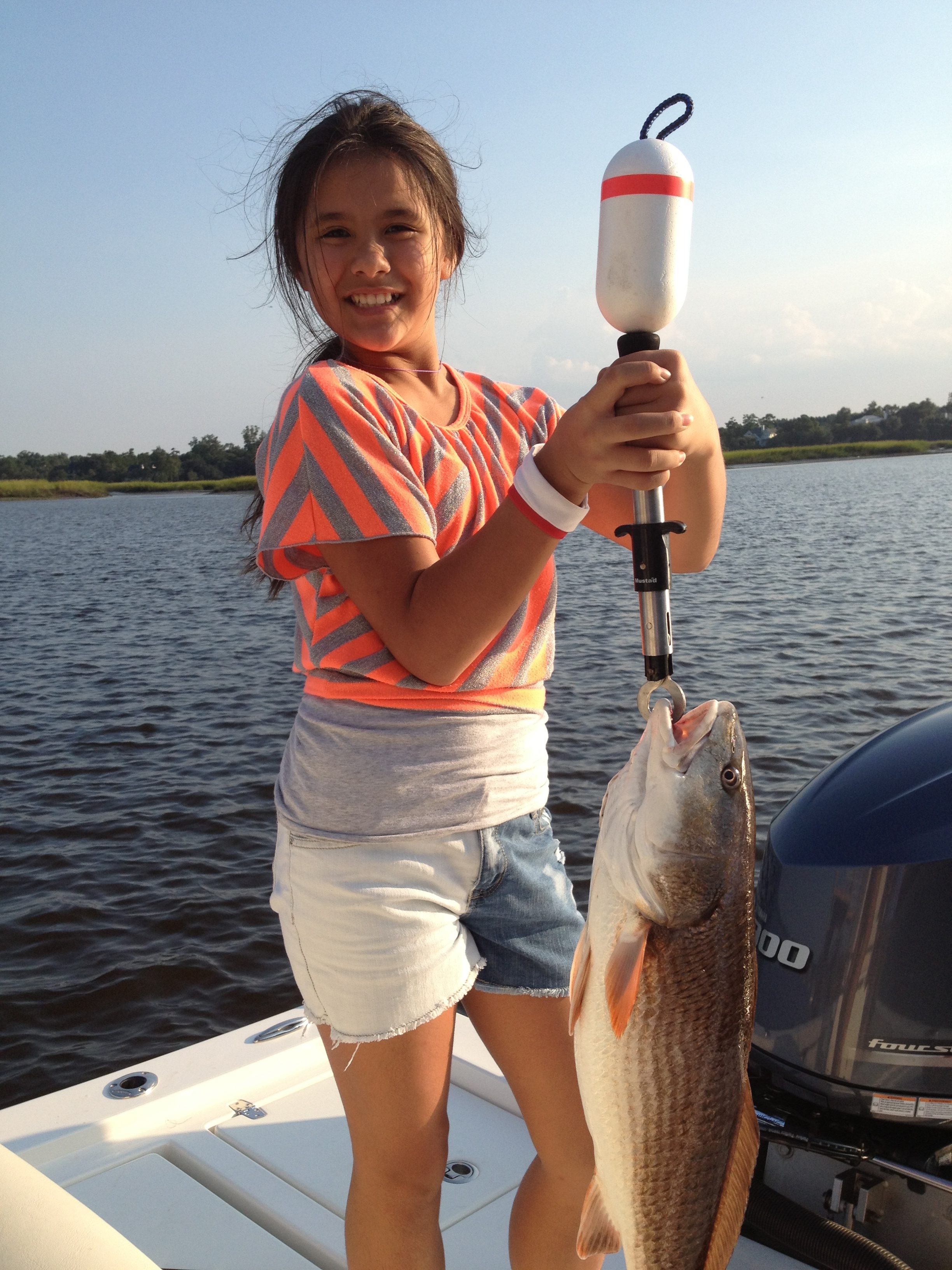 Little Girl Gets a Workout Four big redfish one after the other 