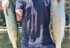 JJ Hewett with a pair of nice trout.