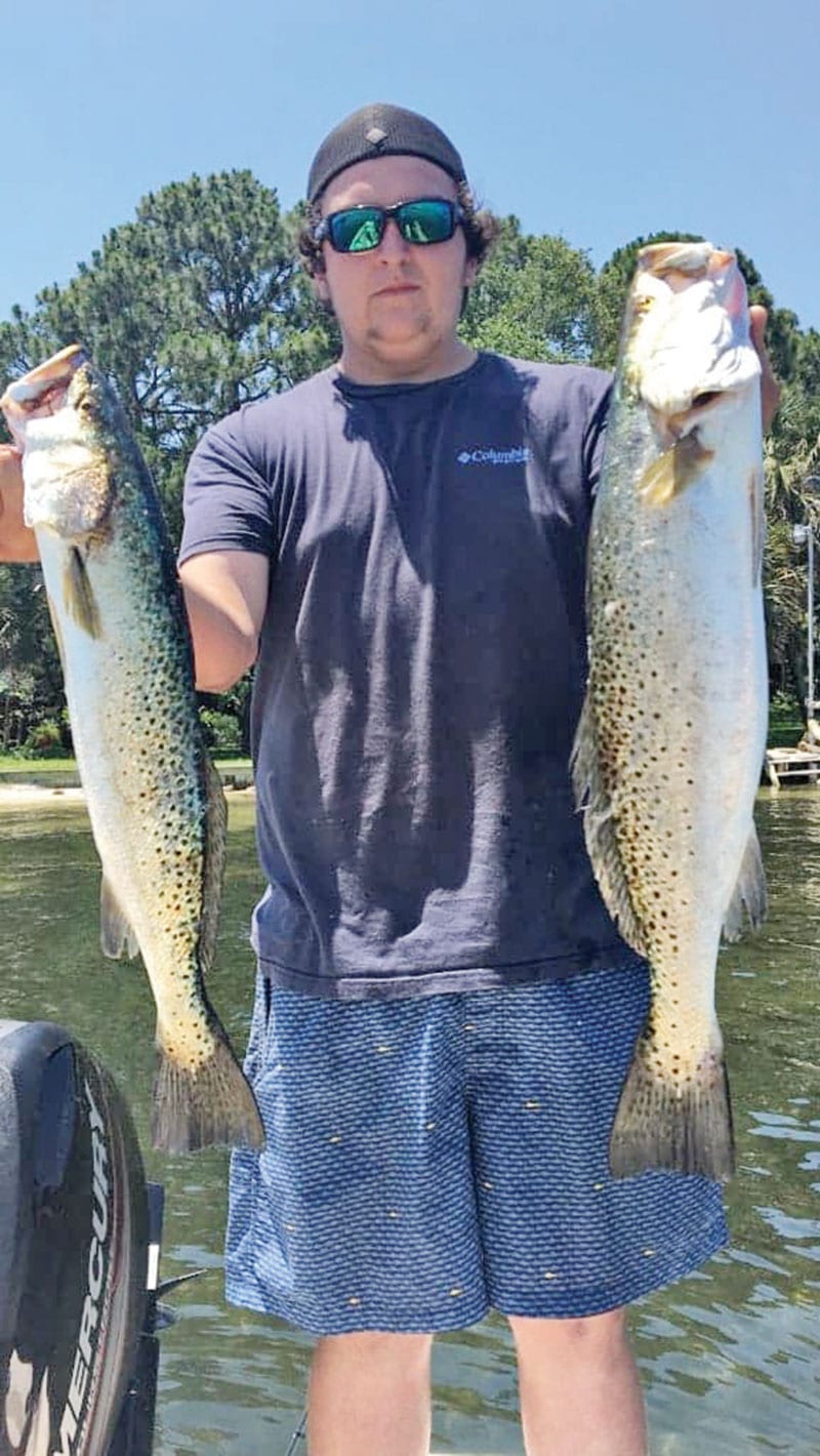 JJ Hewett with a pair of nice trout.