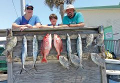Jennifer, Clayton and James getting it done aboard the C-note boat.