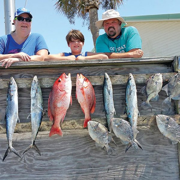 Jennifer, Clayton and James getting it done aboard the C-note boat.