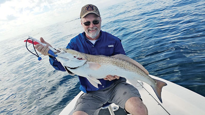 Jody was all smiles after finally landing his first ever redfish.