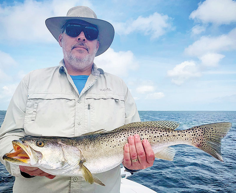 John Breffle with a 28 inch gator trout caught and released in St. Joe Bay.