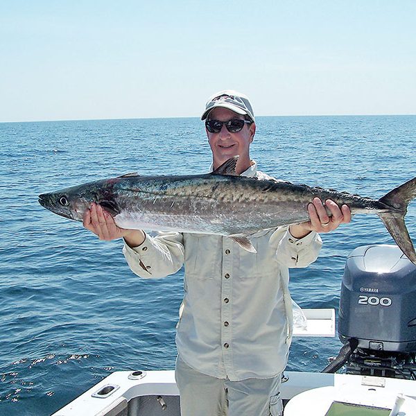 John David with a 30lb. king with Capt. Chester Reese.