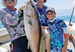 John Sawyer and son from Union City, TN, caught this 60 lb AJ aboard the Kitchen Pass with Capt Tew.