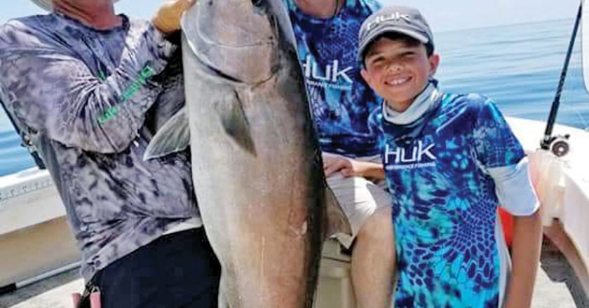 John Sawyer and son from Union City, TN, caught this 60 lb AJ aboard the Kitchen Pass with Capt Tew.