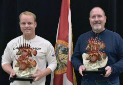 Josh Livingston and Ken Ayers pose with their trophies at a recent FWC award presentation in Panama City.