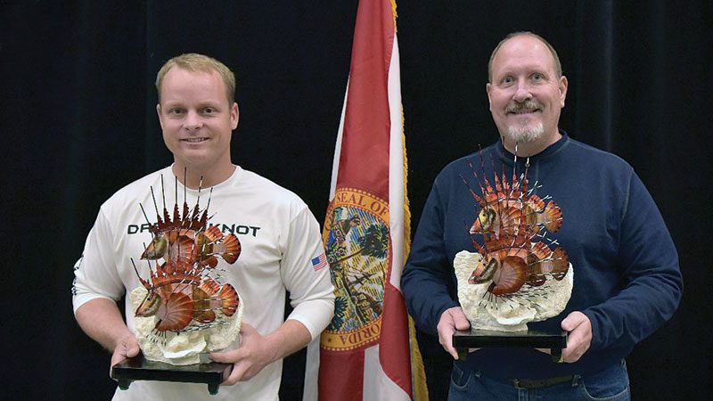 Josh Livingston and Ken Ayers pose with their trophies at a recent FWC award presentation in Panama City.