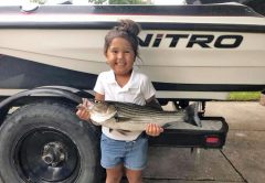 Julliette Samuelson hauled this striper to the boat trolling in East River with her dad, Knowles.