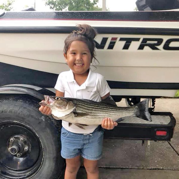 Julliette Samuelson hauled this striper to the boat trolling in East River with her dad, Knowles.