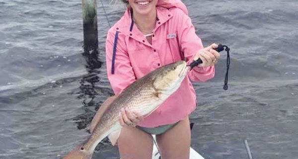 Kinzie Harrington of PC with a rainy day redfish.
