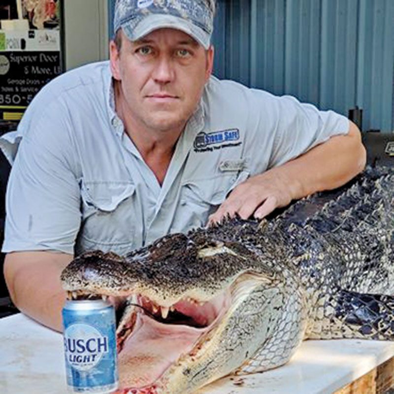 Kyle Oleen with a 9+ foot Washington County gator that weighed approx. 350 lbs.