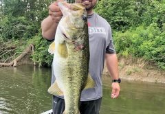 Kyle Pridgen with a giant 9 lb. bass he caught on the Apalacchicola River. A rare find on this river.