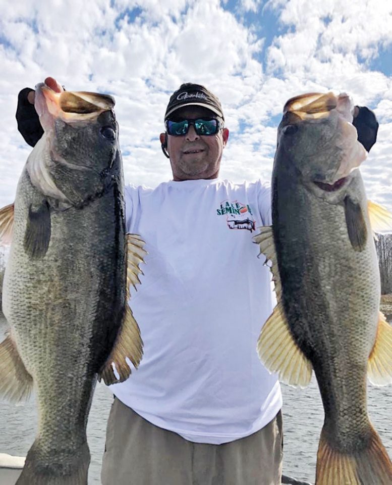 Lake Seminole guide Paul Tyre with a pair of giant Seminole bass.