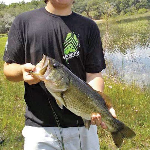 Lancin Dybdal with a nice Grassy Pond bass.