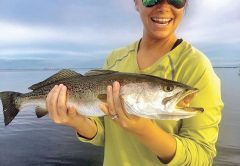 Lindsay Brown all smiles with this trout.