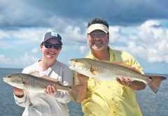 Marcus and Arden from ATL, with a nice red fish double they got with Capt Jordan Todd in St. Joe Bay.