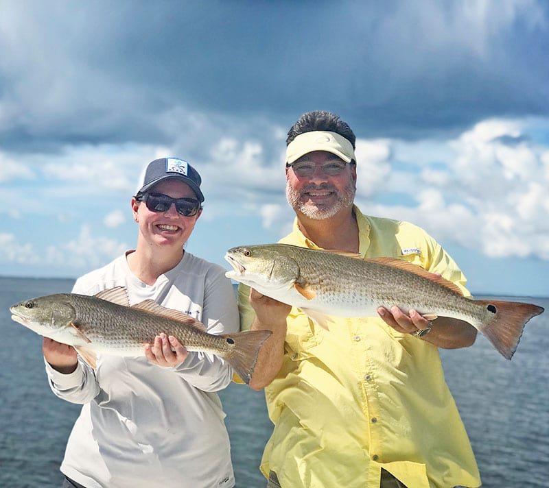 Marcus and Arden from ATL, with a nice red fish double they got with Capt Jordan Todd in St. Joe Bay.
