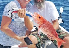 Mary & Justin aboard the C-note boat haulin snapper.