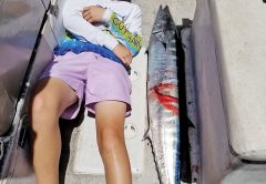 Matthew Tew with a 55 inch wahoo caught 35 miles offshore.