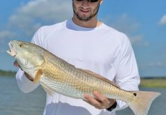 Mike Gomilla, from Tallahassee, with a stud 30 inch redfish.
