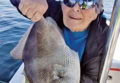 Mrs. Lombardo cranking up the triggers with Capt. Jason.