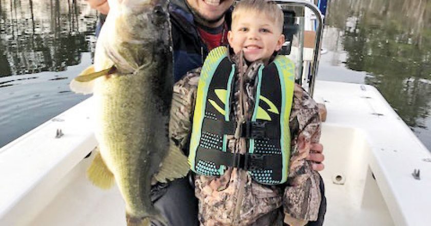Nic Jeter and Cash Whittaker, both of Faceville, GA, with an 8 lb. bass.