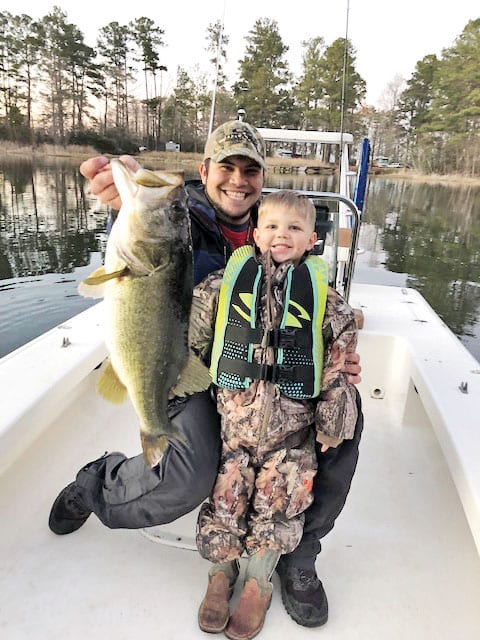 Nic Jeter and Cash Whittaker, both of Faceville, GA, with an 8 lb. bass.