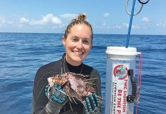 Nikkie Cox with a tagged lionfish off Franklin Co.
