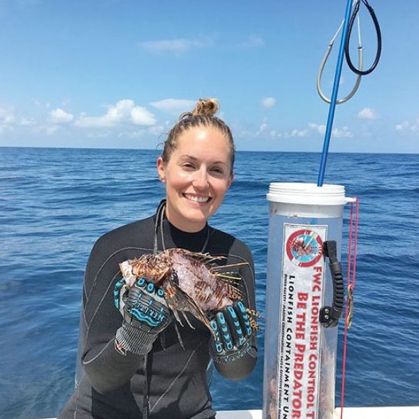 Nikkie Cox with a tagged lionfish off Franklin Co.