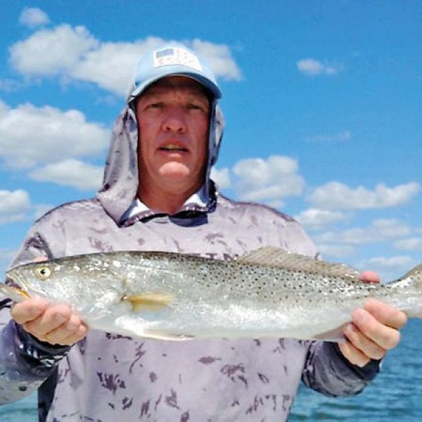 PJ with a gator trout.