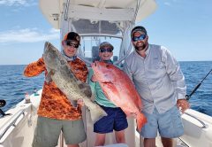 Parker Gillman, Landon Celona & Brian Beighey loading the boat.