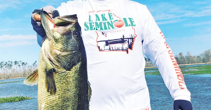 Paul Tyre with a monster Seminole bass caught with a Shaker Z in Azuma Series.
